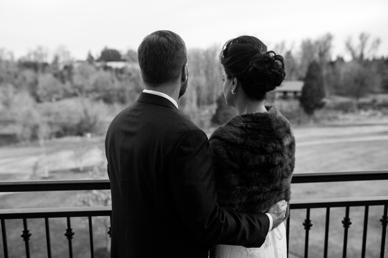 bride and groom on balcony