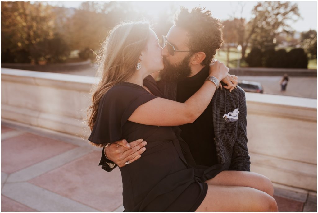 bride and groom kiss during Capitol Hill engagement session