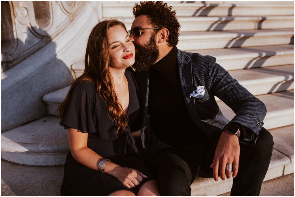 groom kisses bride on cheek during DC engagement photos