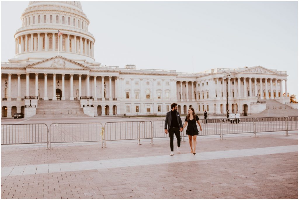 stylish couple walks in front of US Capitol