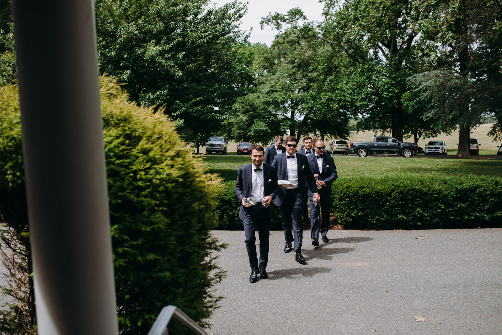 groomsmen walking candid