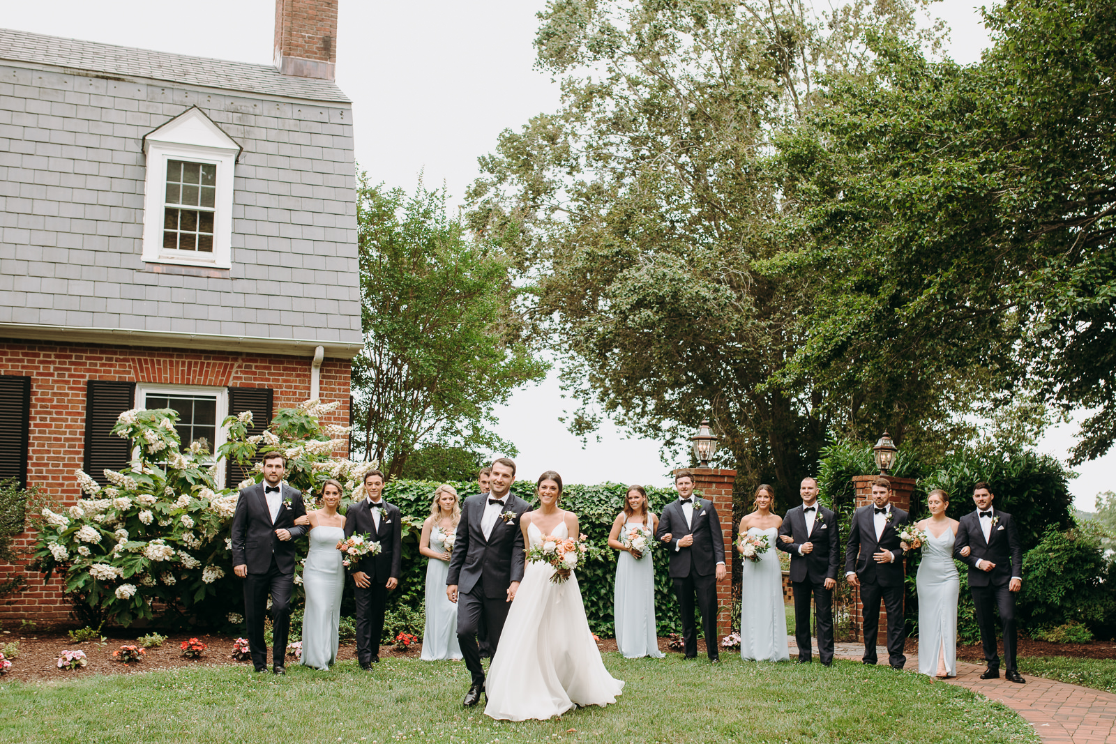 bridal party walking at brittland estates