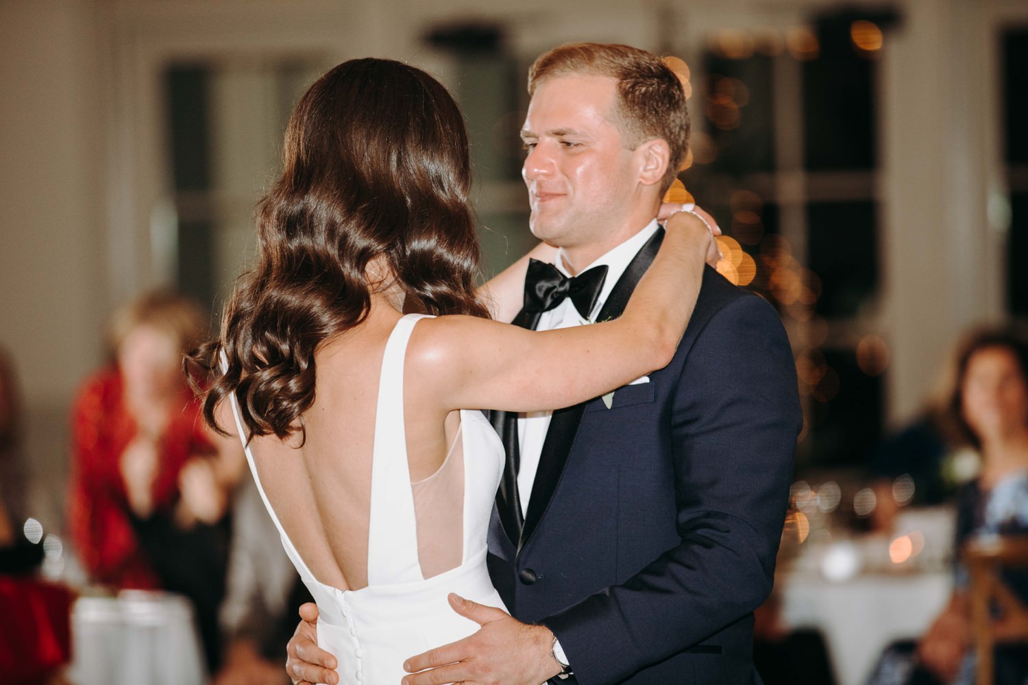 groom looking at bride