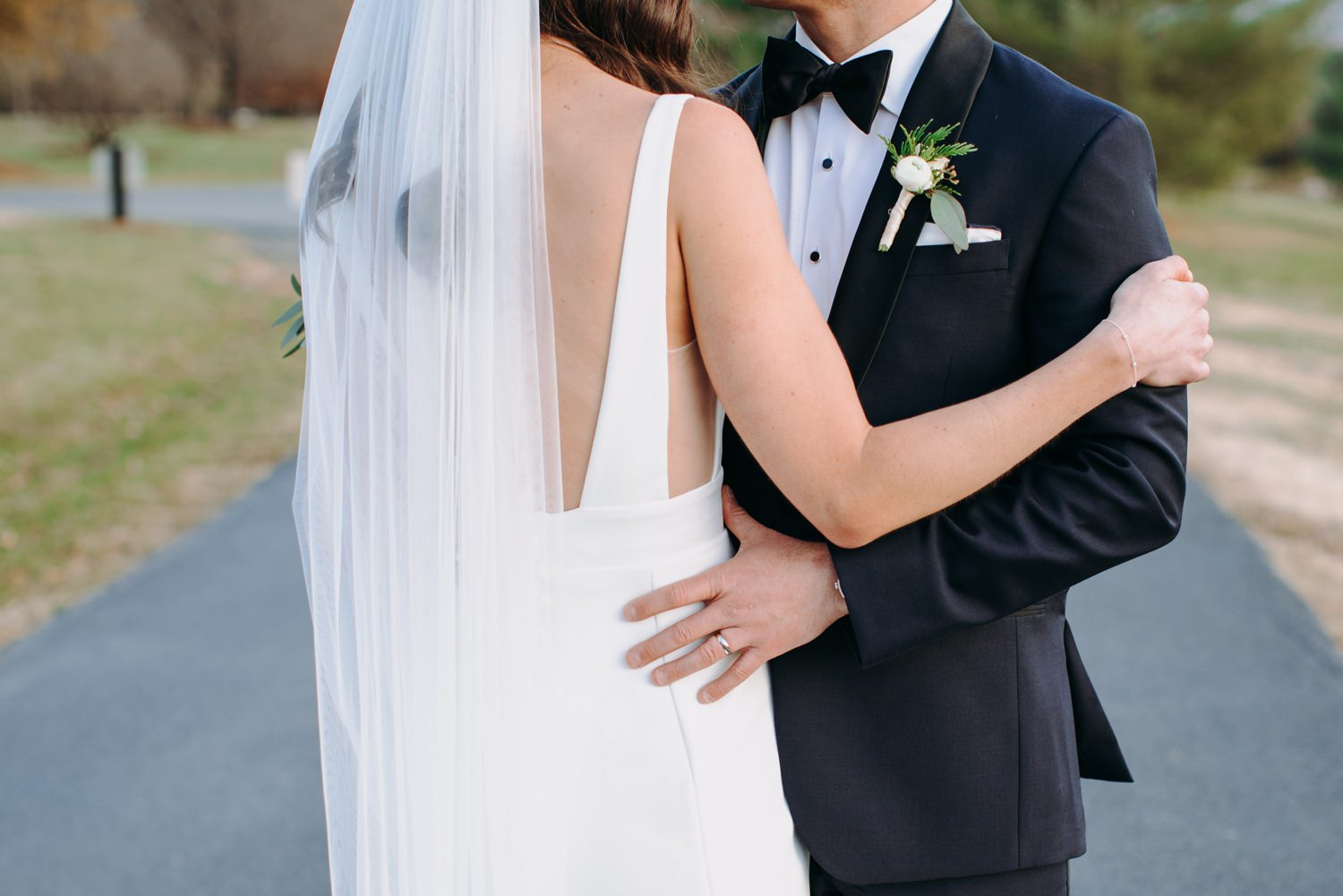 bride and groom outfit closeup