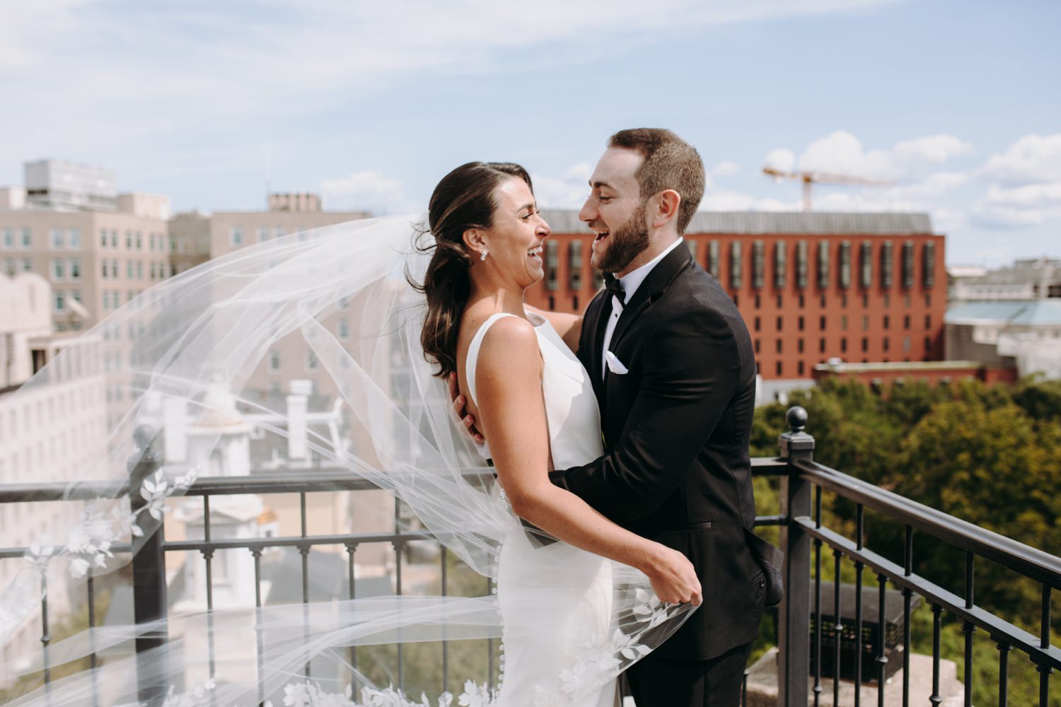 bride and groom hug