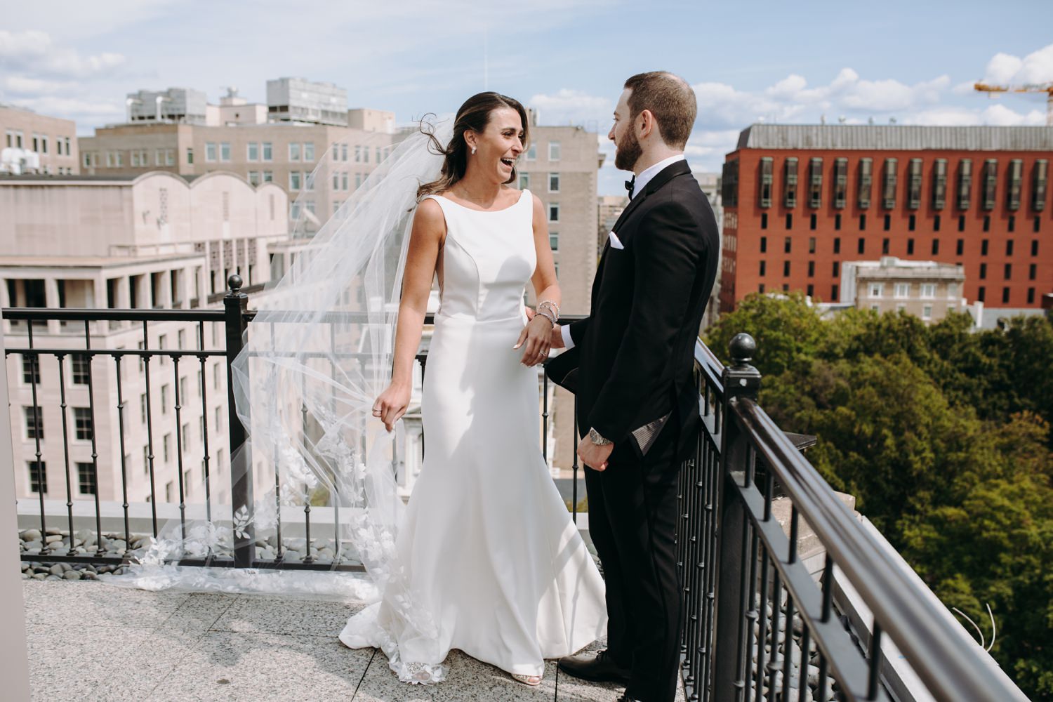 bride and groom laugh