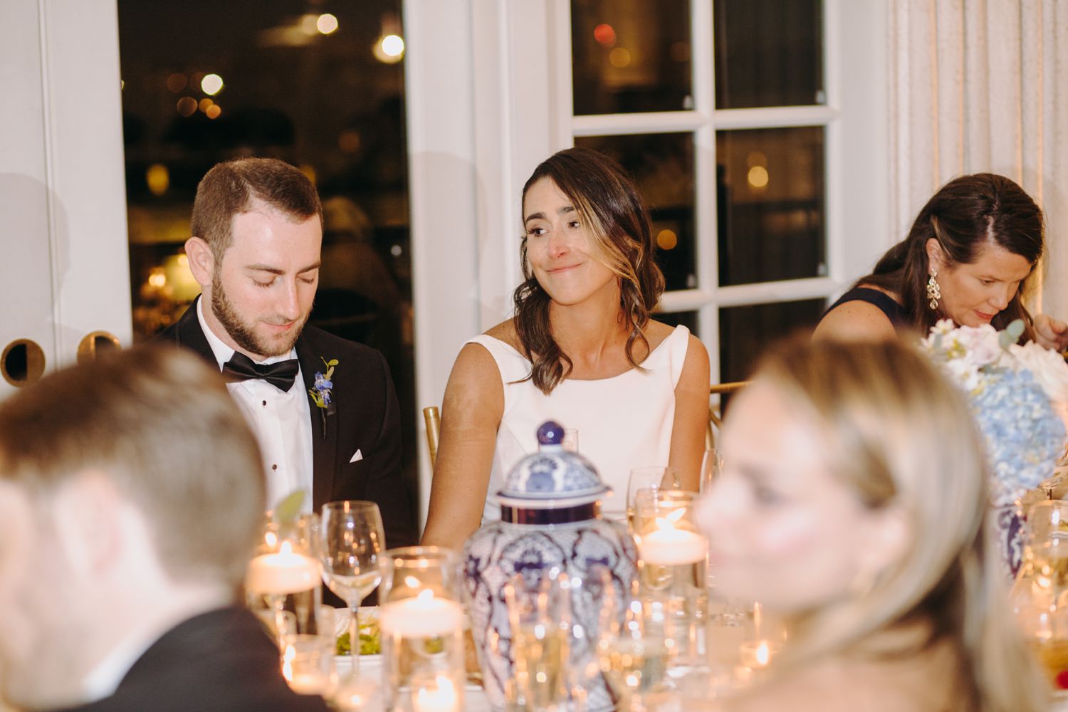 bride looks at groom