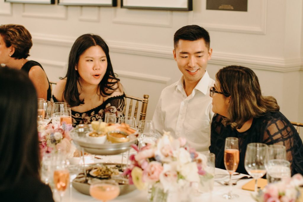 wedding guests talking