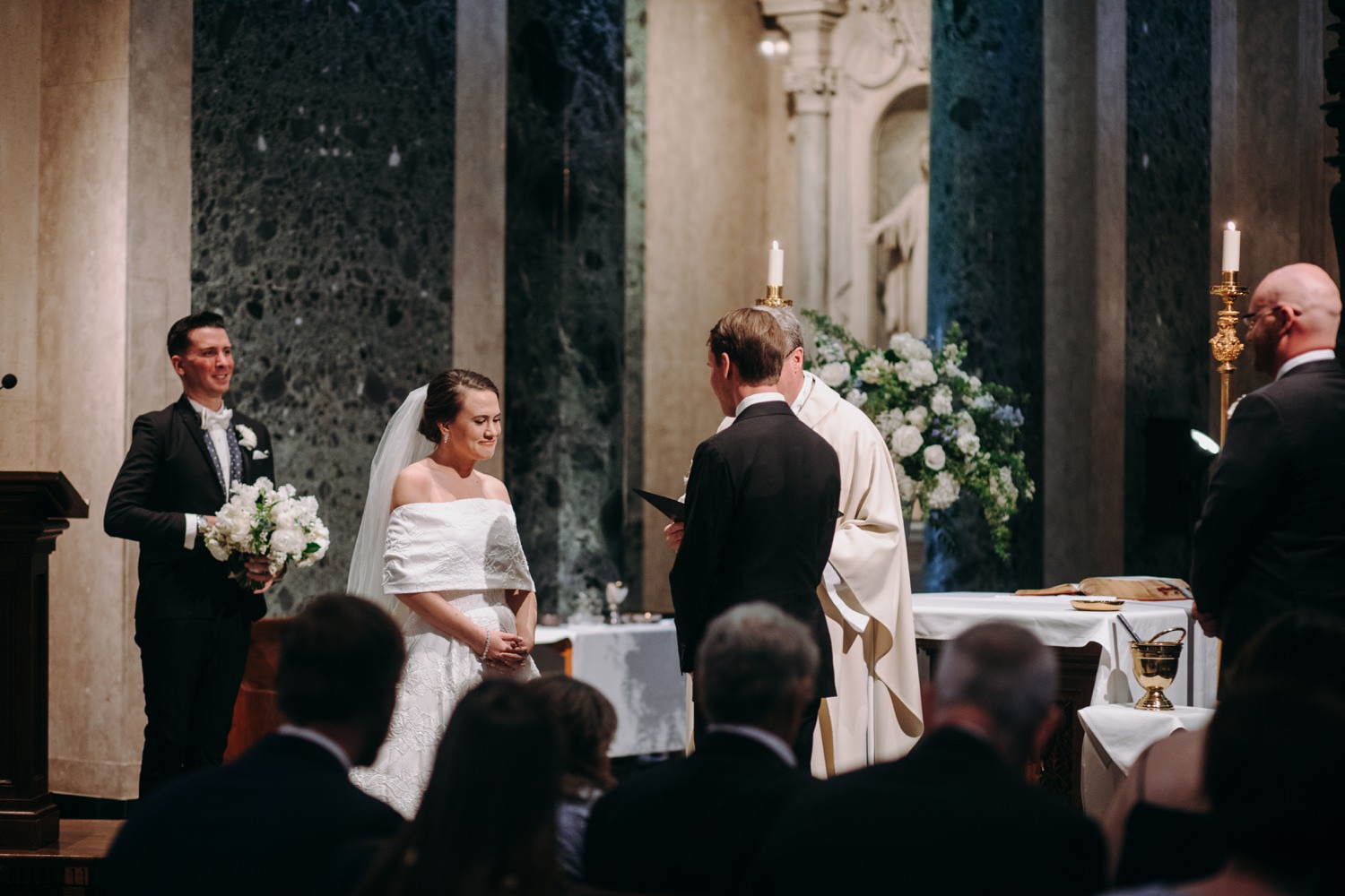 bride facing groom in church