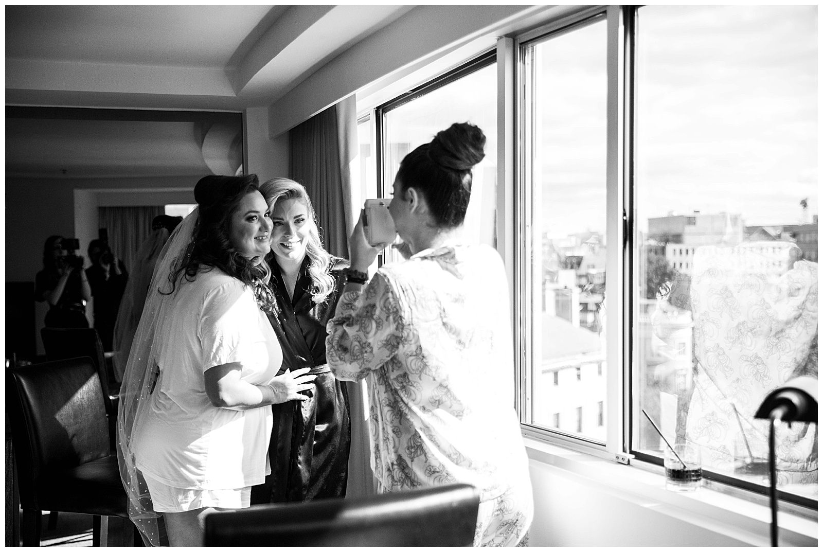 Dupont Circle Hotel Wedding bridesmaids taking photos