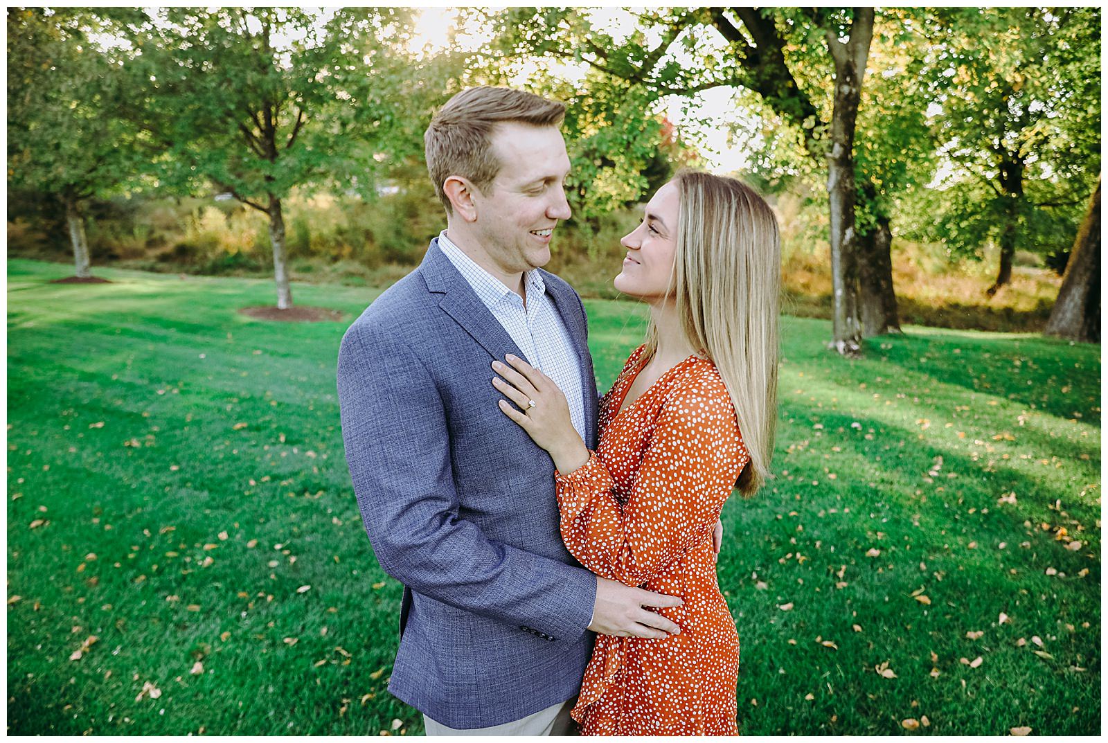 Trump National Golf Club Washington DC engagement session couple smiling at each other