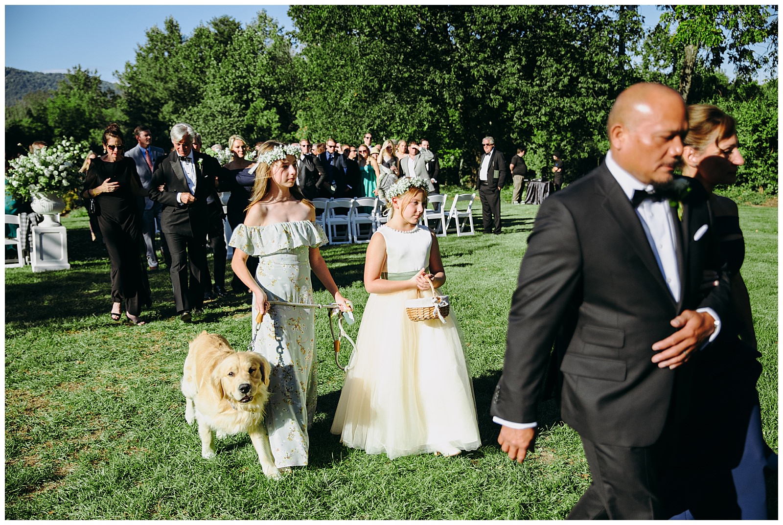 flower girls and dog exiting ceremony