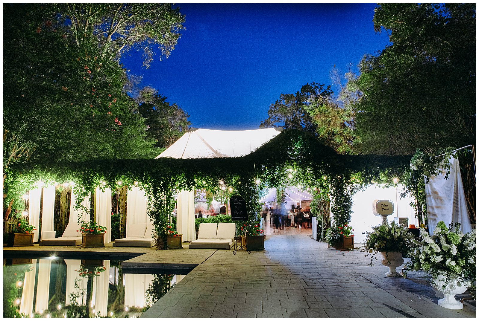 tent at night at a wedding at the Clifton Inn wedding decorated with greenery