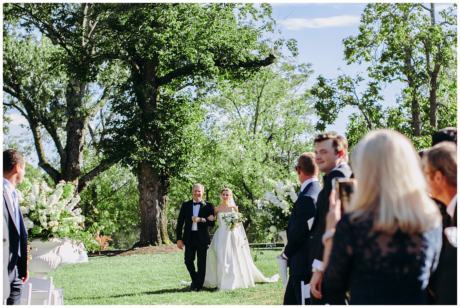 bride walking down the aisle at the Clifton Inn wedding