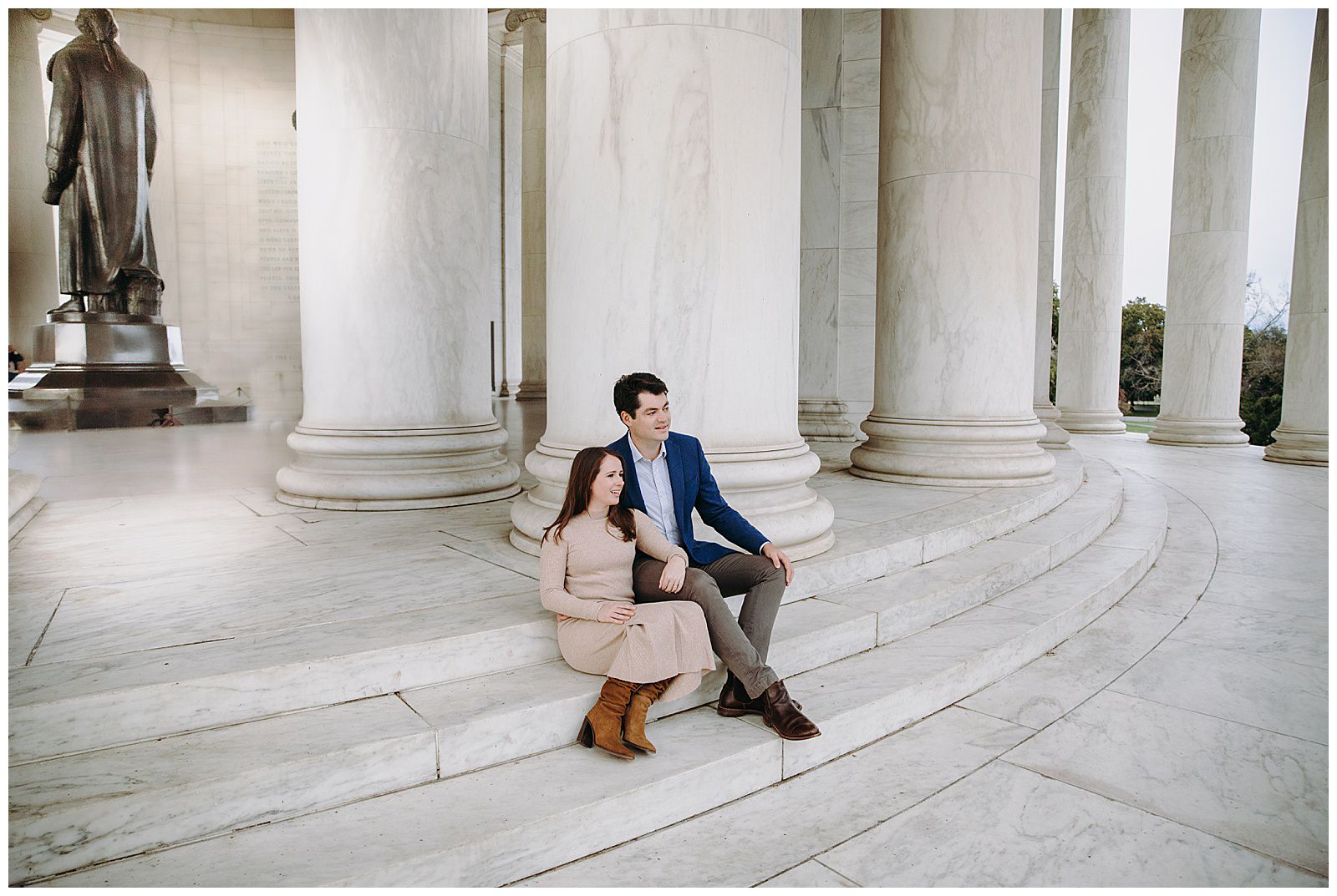 Jefferson Memorial Engagement Photos couple looking away