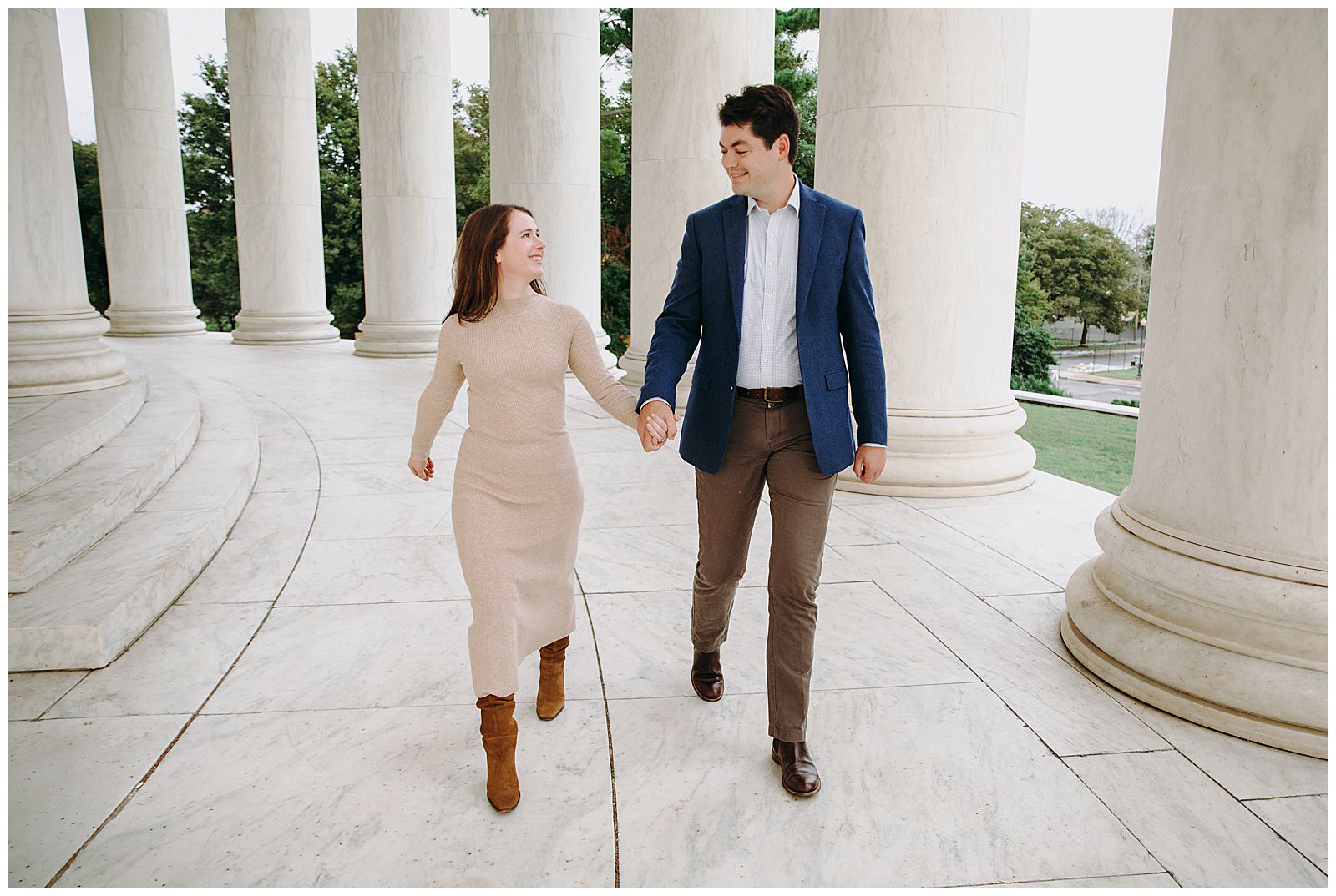 Jefferson Memorial Engagement Photos couple walking together