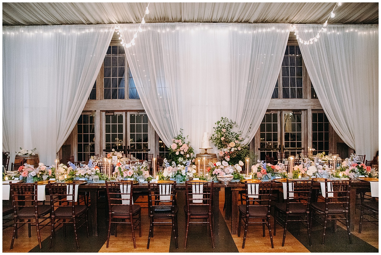 veritas wedding blue tablecloths and pink flowers