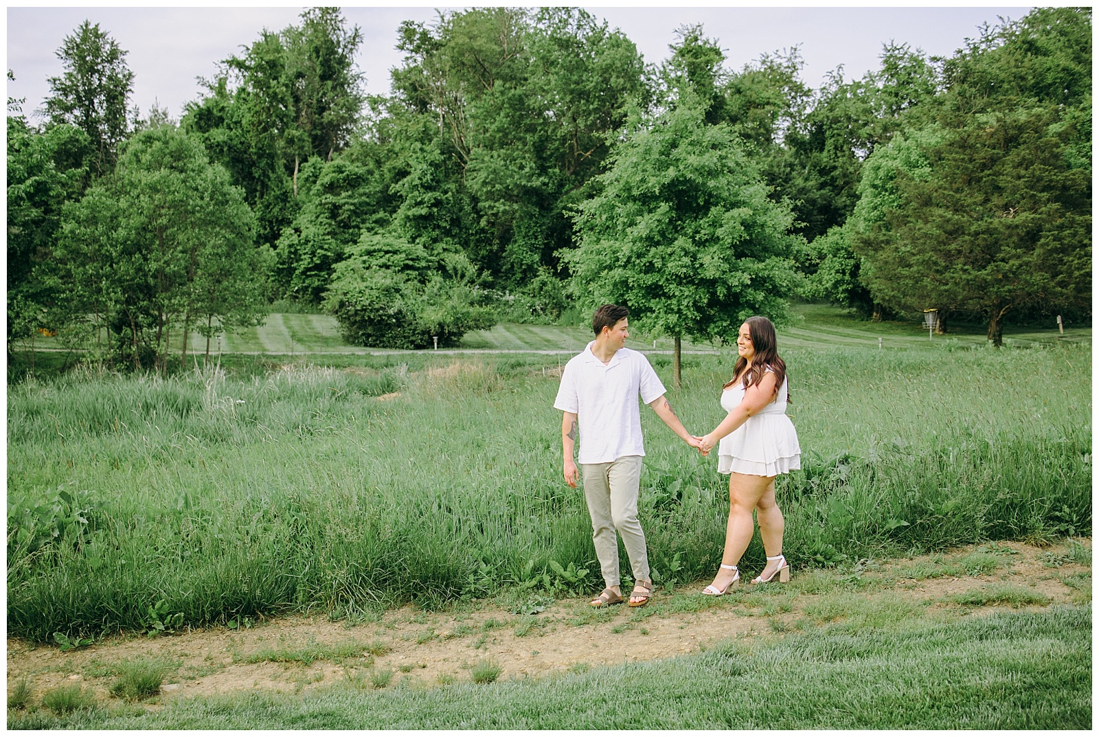 Couple holding hands in Salamander Resort