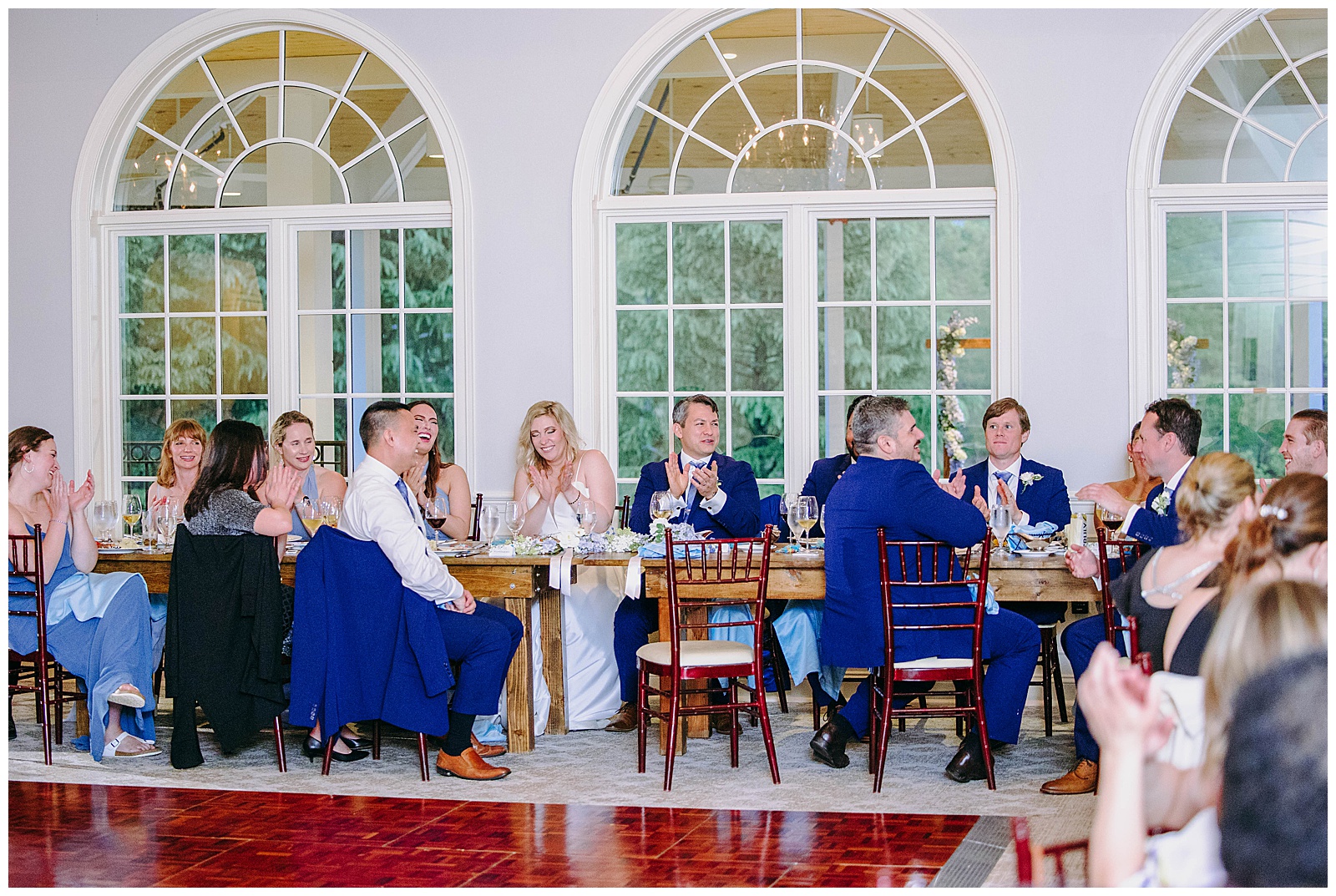 reception at stonewall golf club, people laughing at tables