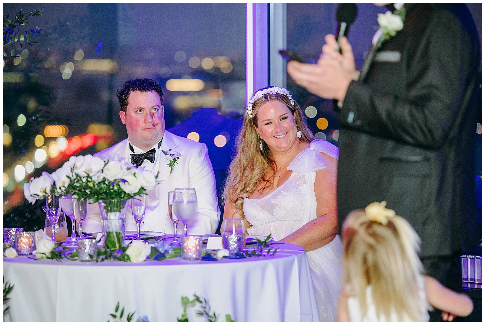 bride and groom at top of the town