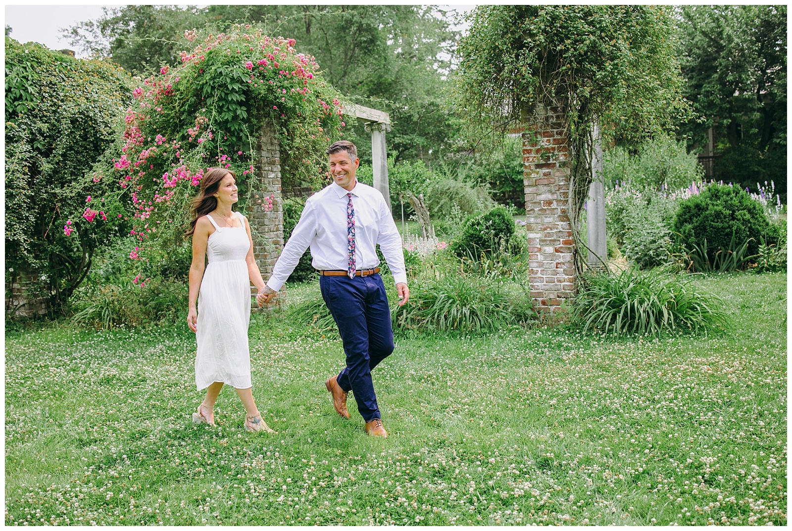 engaged couple walking