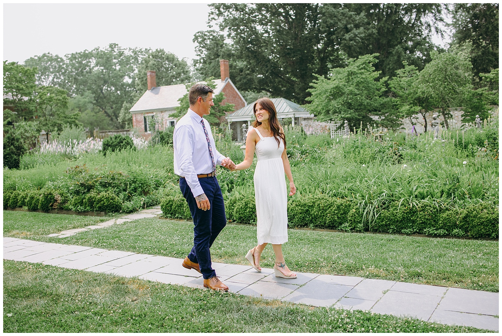 engaged couple walking