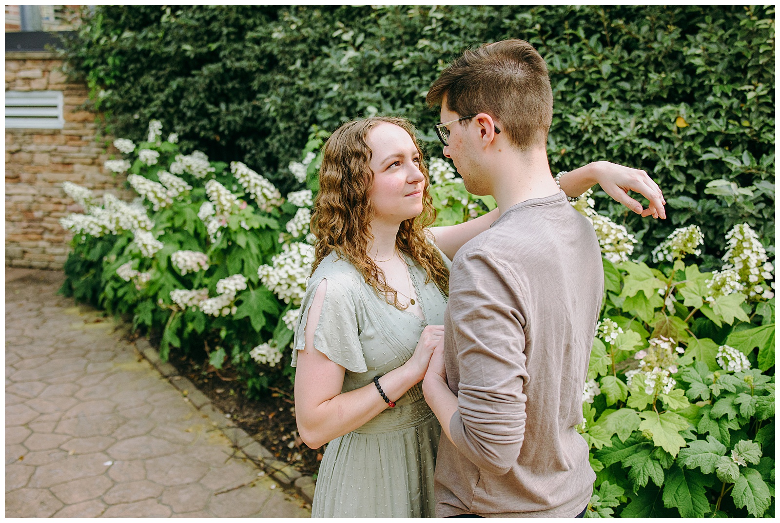 couple looking at each other at summer photoshoot