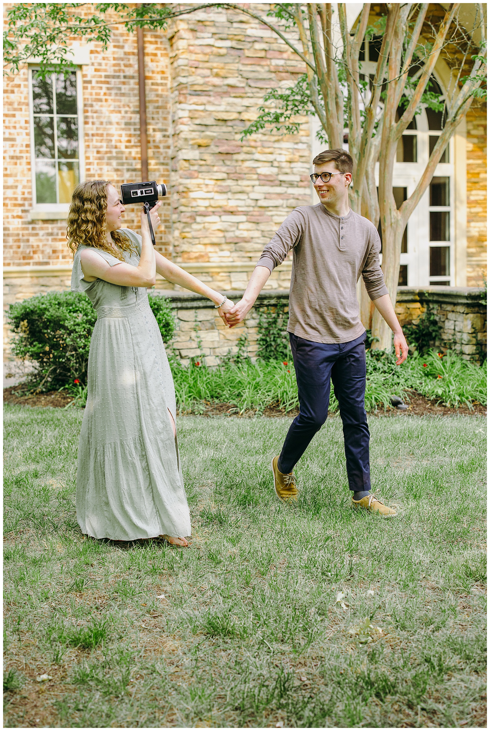 couple photographing each other on a super 8 camera