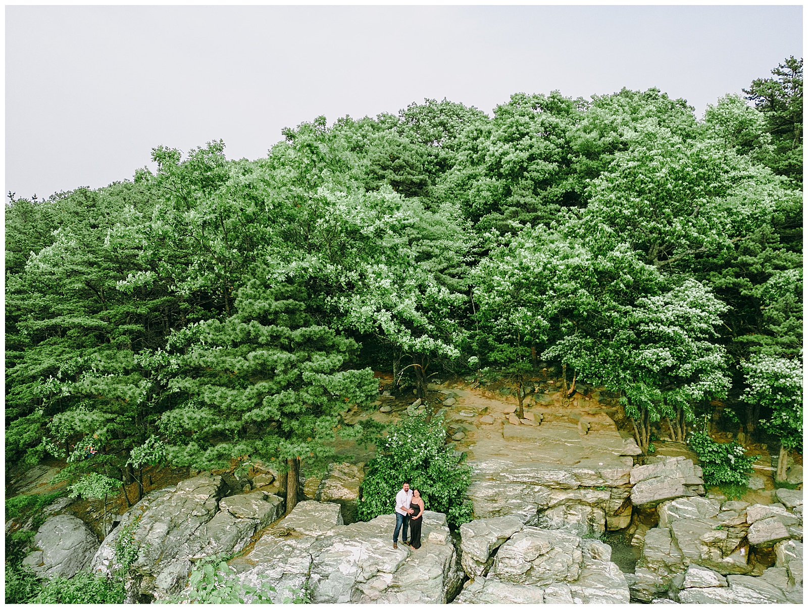 drone maternity photos in virginia, couple standing on bears den overlook