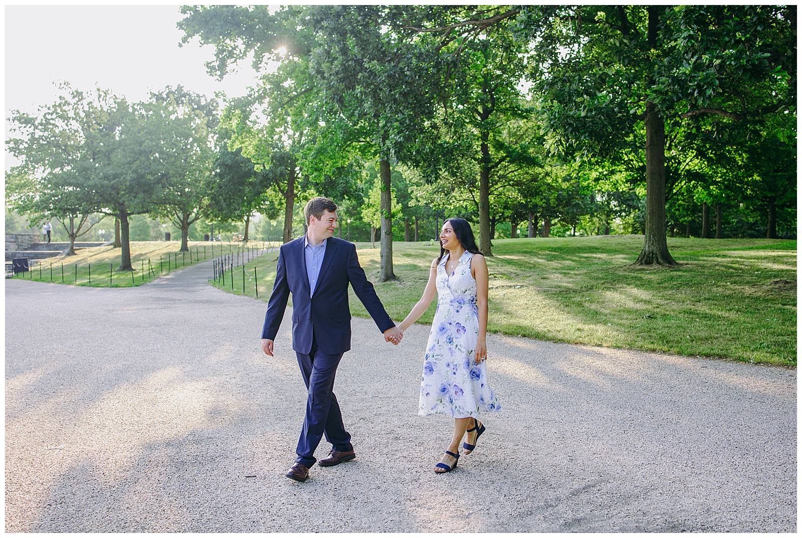 groom leads bride on a stroll at the national mall